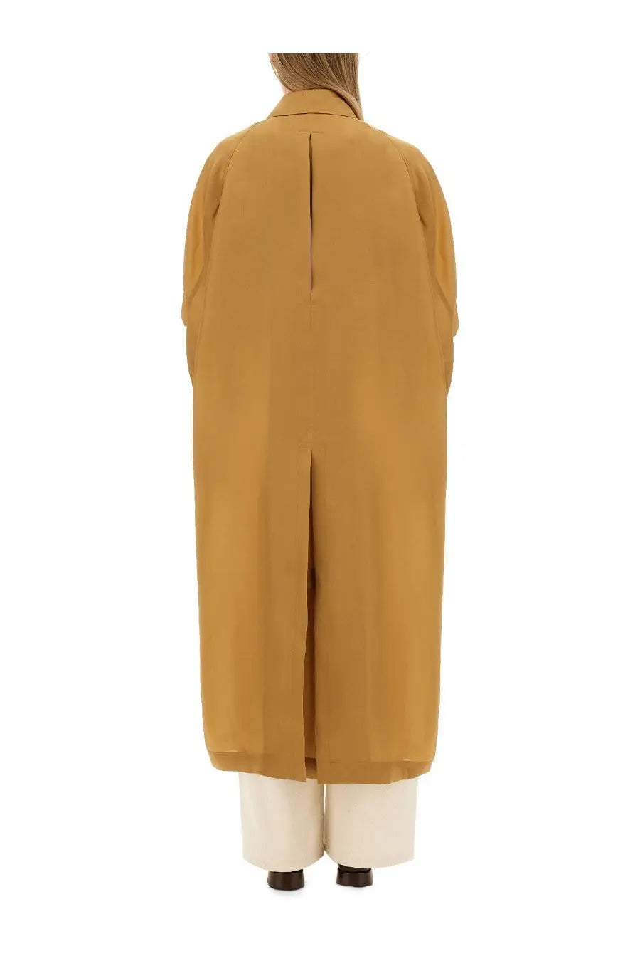 Back view of max mara women’s sack beige coat in mustard yellow with central seam and wide sleeves