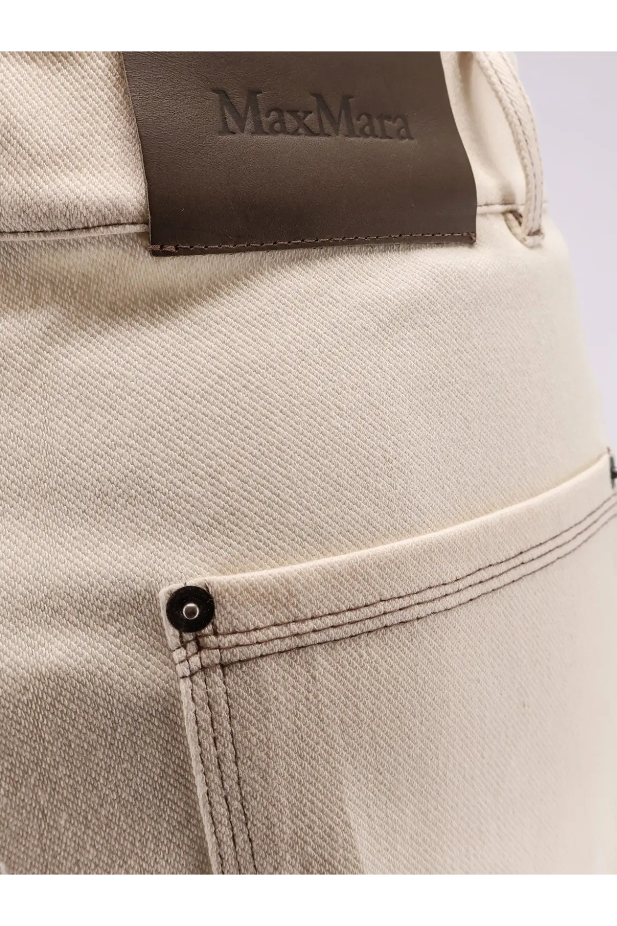 Beige denim max mara women’s cotton blend mxpribes trousers with brown leather label and black button fastening