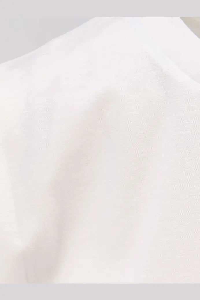 Max Mara women’s Donata white cotton shirt showing soft fabric with smooth texture and subtle natural folds