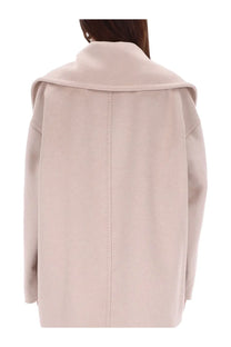 Back view of max mara women’s double breasted wool coat mario in beige with wide collar and straight stitching