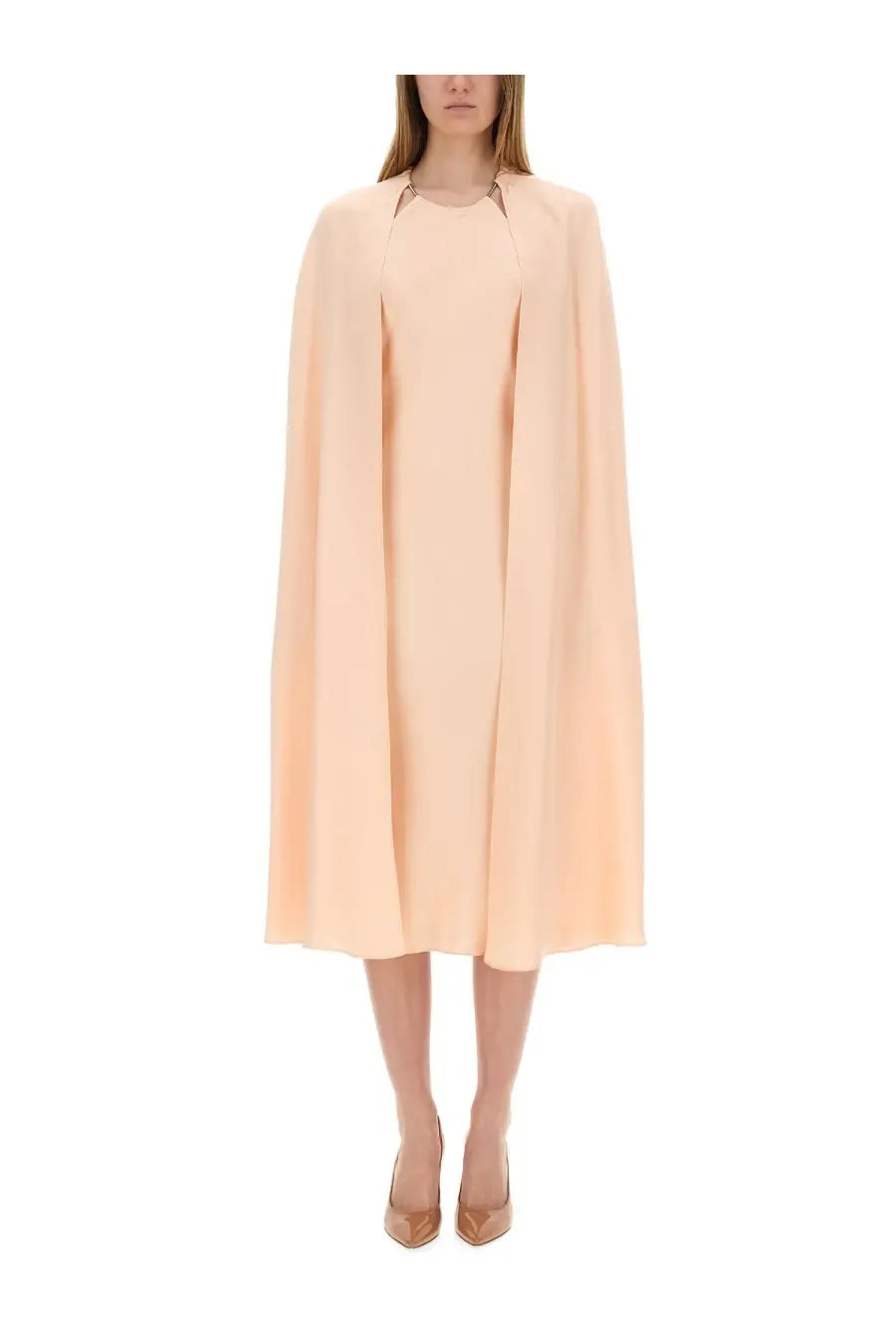 Max mara women’s flowing cape dress in soft peach with sleek minimalist design and subtle metallic neckline accents