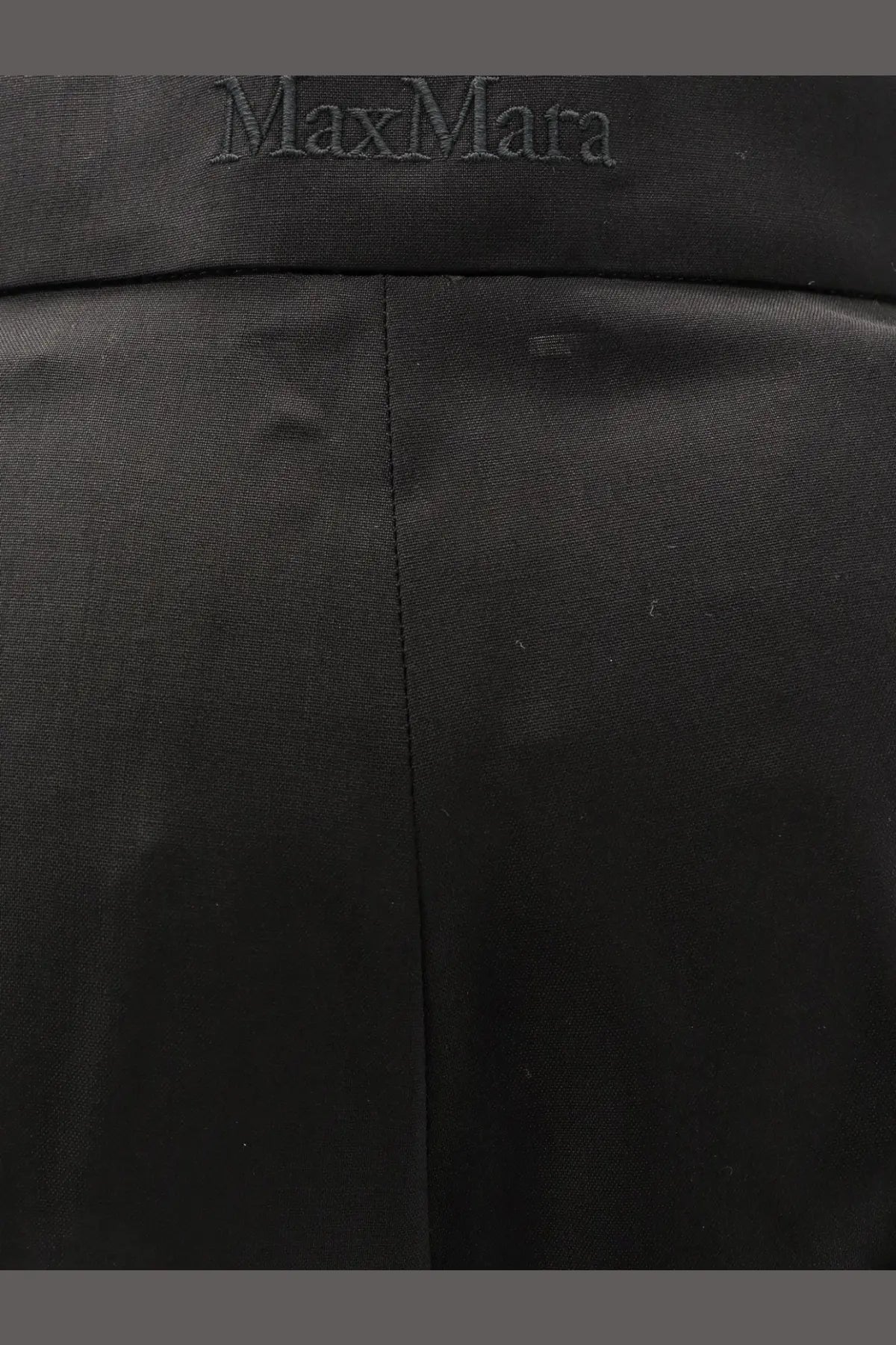 Black max mara women’s fernet virgin wool trousers with smooth tailored fabric and subtle seam stitching front view