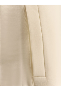 Cream-colored satin fabric with smooth reflective surface and stitching on max mara filovia jogger silk cotton trousers white
