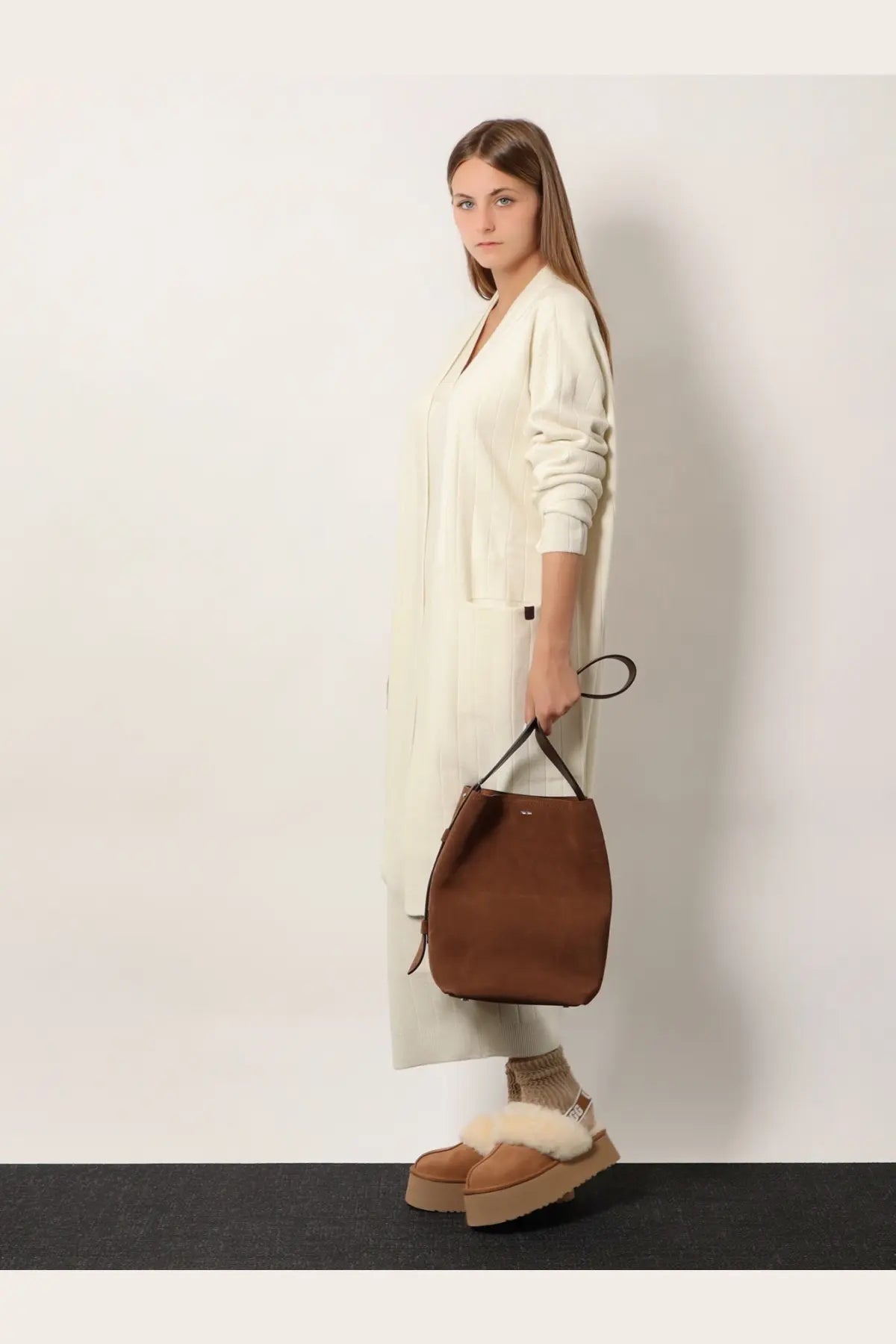Brown suede bucket bag with black handles paired with max mara womens giusto cashmere cardigan white