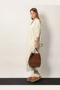 Brown suede bucket bag with black handles paired with max mara womens giusto cashmere cardigan white