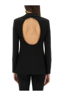 Back view of max mara women’s black blazer featuring a large oval cutout and tailored fabric design