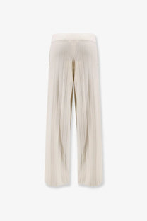 Cream-colored pleated wide-leg max mara jardin cashmere trousers with smooth flowing fabric and subtle vertical seams