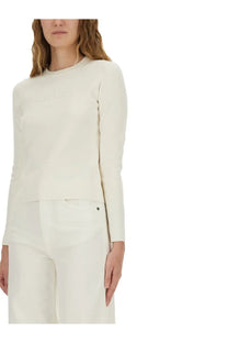 Cream-colored max mara women’s jersey long-sleeved top with relaxed fit and subtle seam detailing