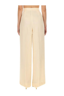 Cream-colored high-waisted wide-leg max mara women’s klaus pants in smooth flowing fabric beige color