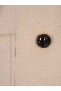 A glossy black quilted button on the beige cashmere fabric of the Max Mara womens Mario double breasted coat