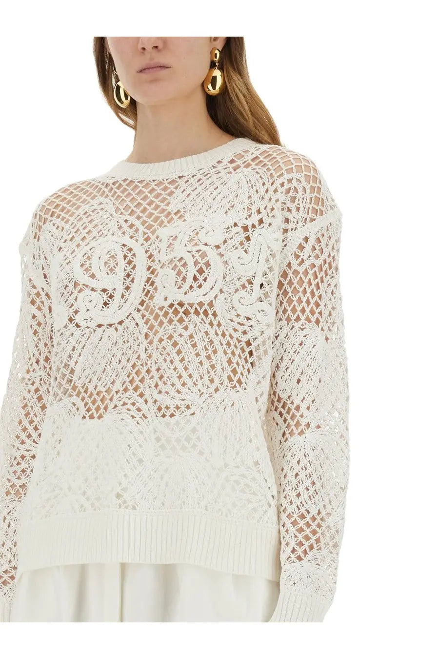 Max Mara women’s white lace-knit sweater with intricate floral embroidery and ribbed hem detail