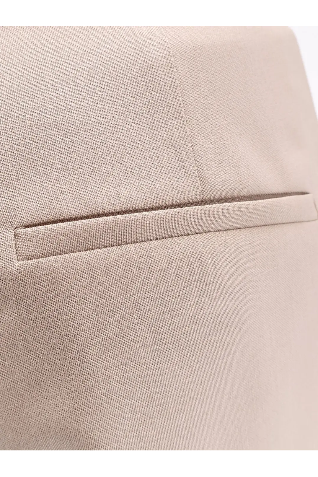 Beige textured fabric blazer with subtle woven pattern and tailored flap pocket paired with max mara green mohair silk trousers