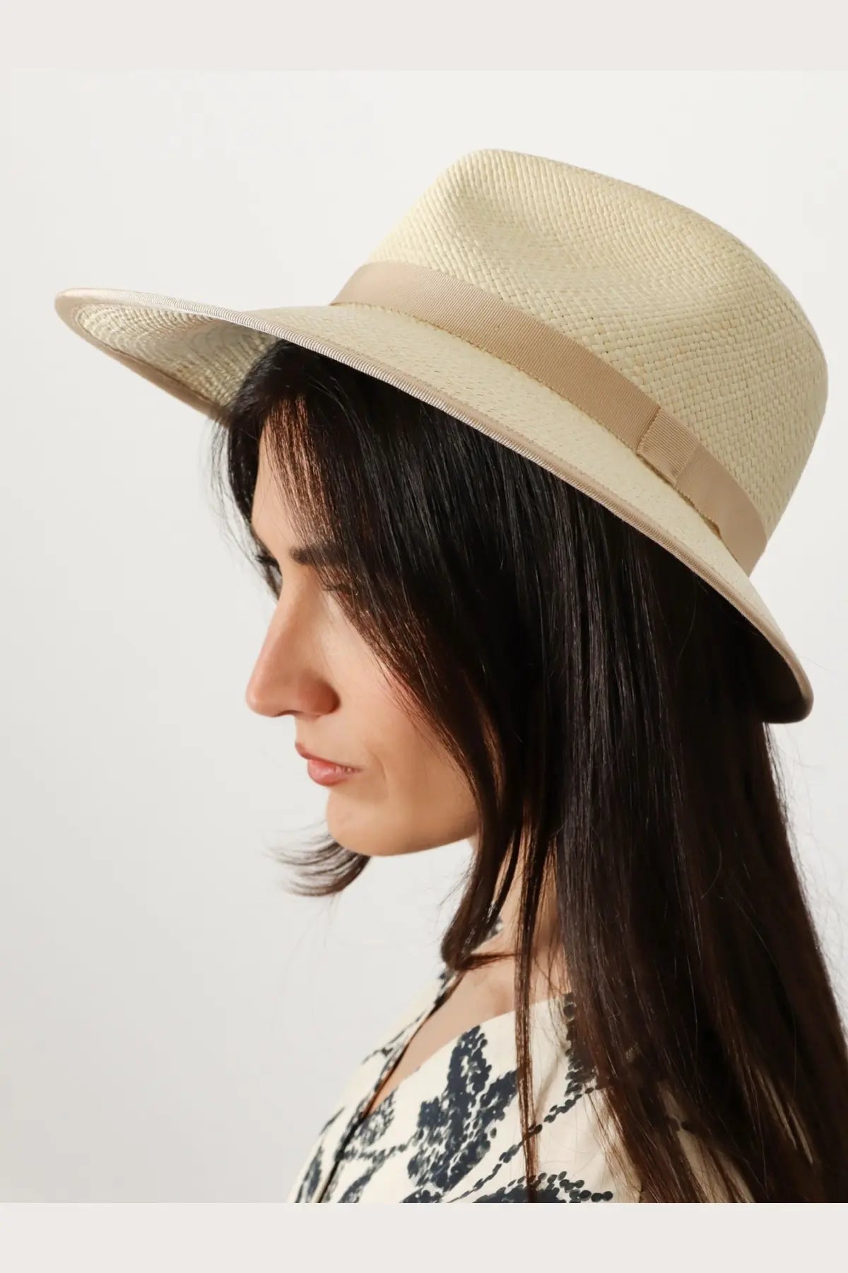 Beige woven straw fedora hat with matching ribbon band from Max Mara women’s Mxadolmen collection