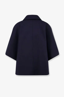 Max Mara women’s Mxapaggio cotton cape blue with a sleek navy blue color, structured collar, and wide flowing sleeves