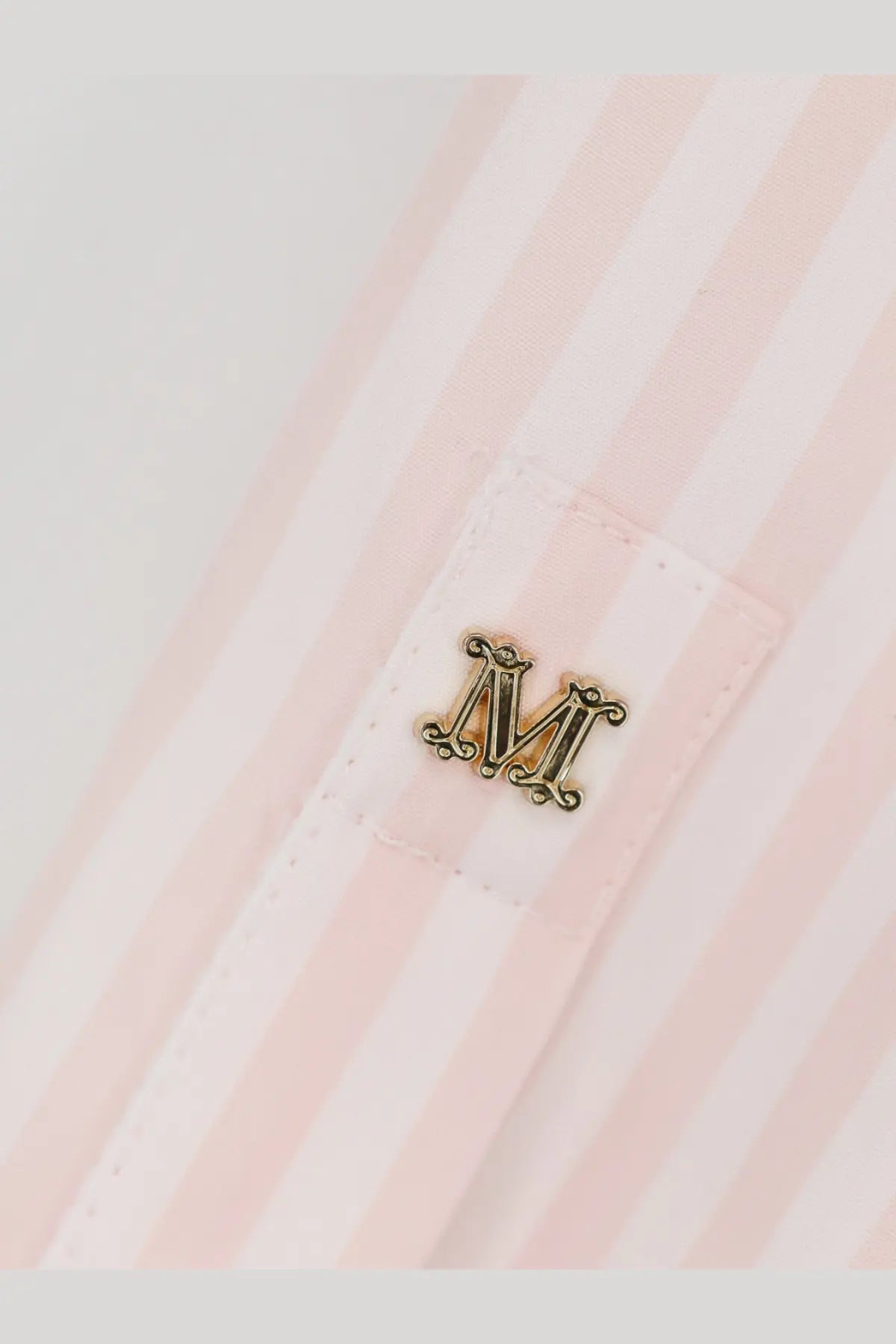 Gold-toned ornate m logo pin on the pink and white striped cotton shirt cuff of Max Mara womens mxmaccenni shirt