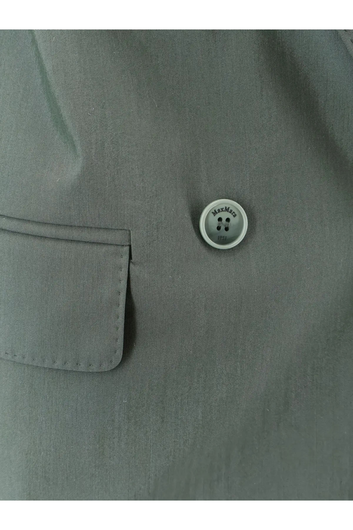 Maxmara women’s green virgin wool and silk blazer featuring a sleek silver-toned button with four holes and minimalist design