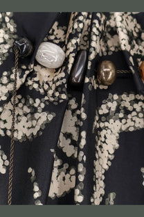 Max mara women’s mxmcartone black silk dress paired with black and white floral silk scarf and polished stone pendants