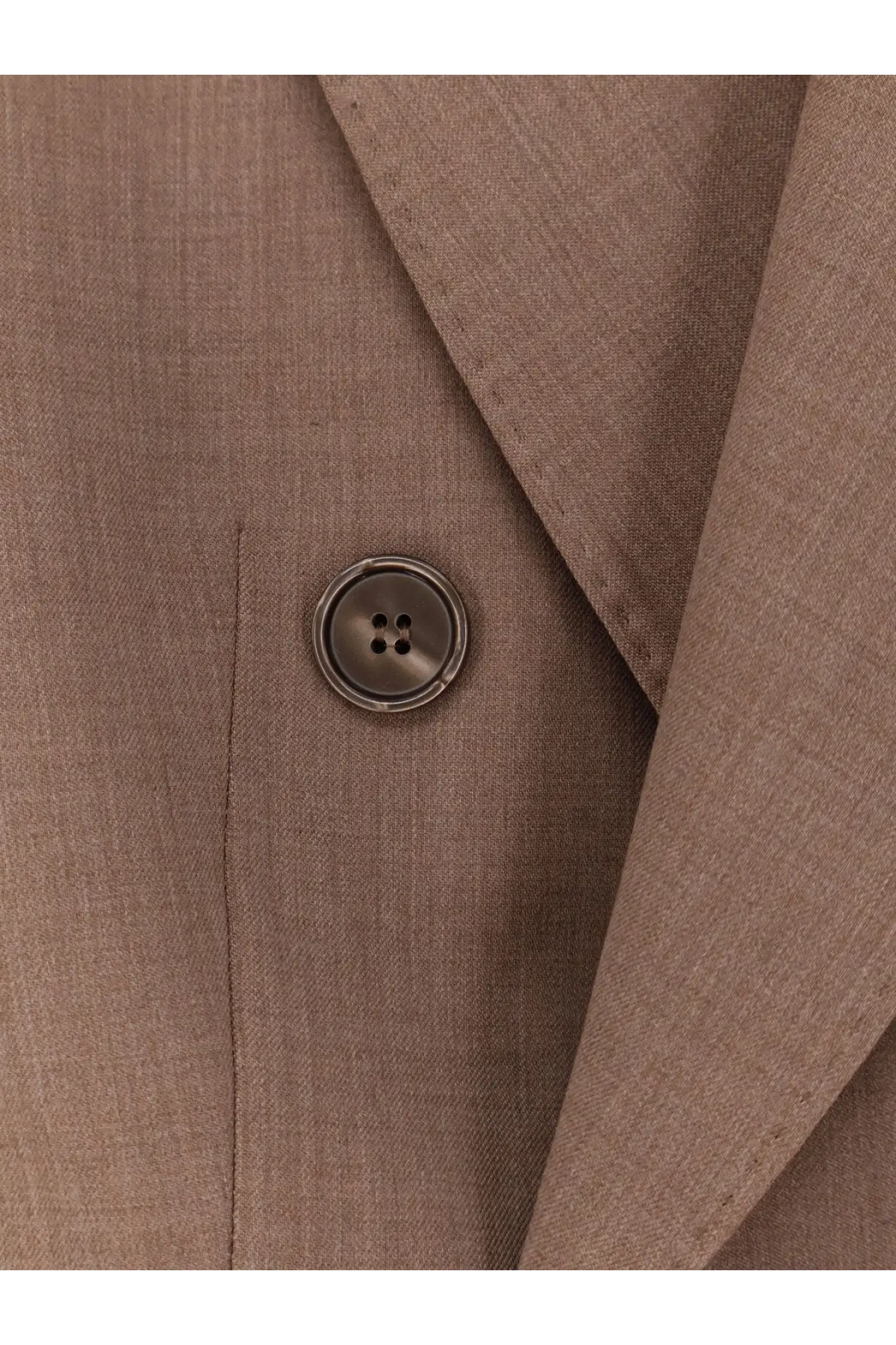 A dark metallic button with four holes on the textured beige virgin wool fabric of max mara mxmcupola blazer