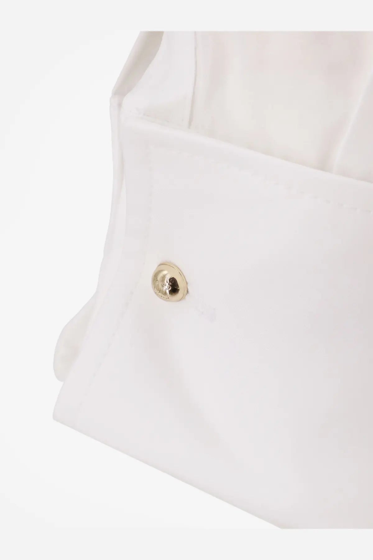 A gold-toned button with an engraved logo on the white cotton fabric of a max mara women’s mxmcurvone shirt