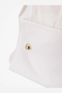 A gold-toned button with an engraved logo on the white cotton fabric of a max mara women’s mxmcurvone shirt