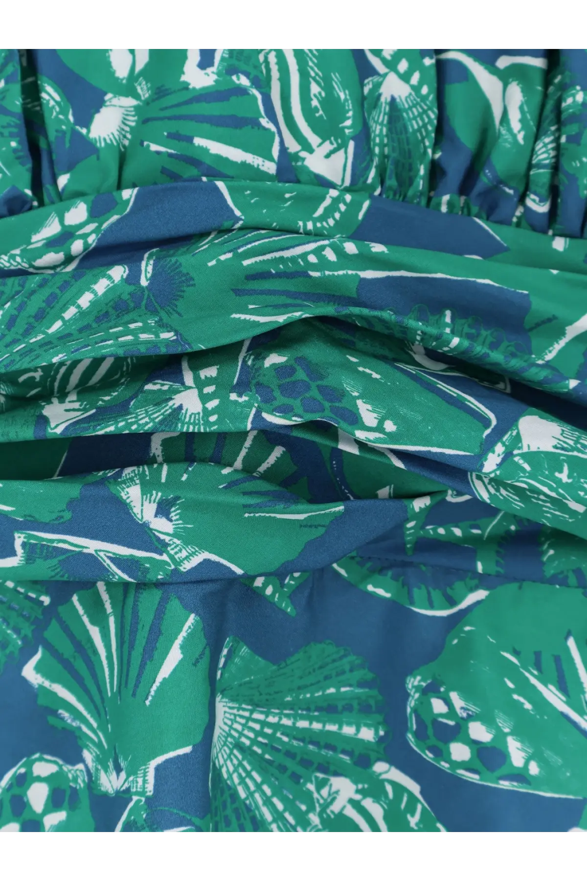 Max Mara women’s mxmebella printed cotton dress in vibrant green and navy blue with bold white seashell print