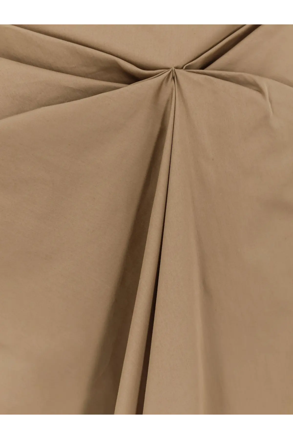 Max mara women’s mxmpaggi cotton blend skirt in beige showing smooth slightly wrinkled cotton fabric texture
