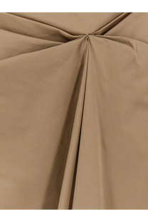 Max mara women’s mxmpaggi cotton blend skirt in beige showing smooth slightly wrinkled cotton fabric texture