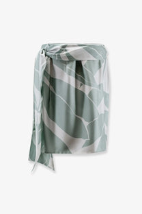 Max Mara women’s Mxmstrano silk pareo skirt in white with sage green leaf pattern made of smooth satin fabric