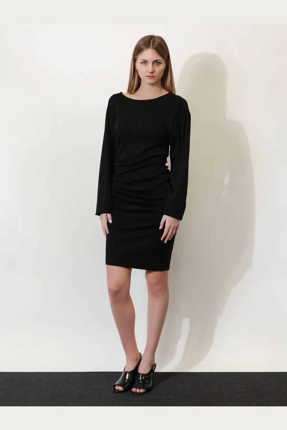 Max Mara women’s mxpumido black virgin wool dress with long sleeves and ruched waist detail in a form-fitting style