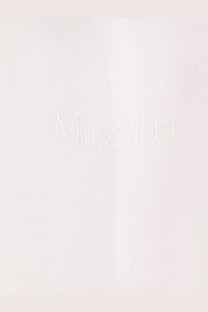 Minimalist white Max Mara logo embossed on smooth matte surface of Max Mara women’s Nerina cotton shirt white