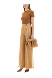 Tan fabric clutch with gathered ruched detailing paired with max mara women’s pants danila beige product image