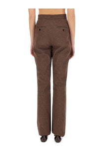 Back view of max mara women’s brown textured wool high waist pants with two back pockets galicia style