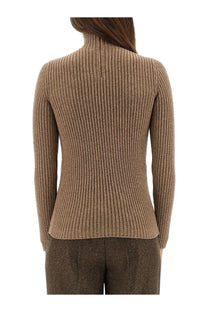 Max Mara women’s ribbed camel cashmere turtleneck sweater with a fitted silhouette