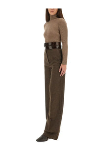 Brown wide-leg trousers with subtle textured pattern and high waist paired with max mara ribbed turtleneck sweater
