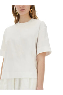 Max Mara women’s white short-sleeved Estella shirt with a relaxed fit and subtle textured fabric