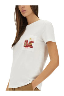 Max Mara women’s white cotton t-shirt with decorative embroidered patch featuring red and gold lettering pink flowers and hearts