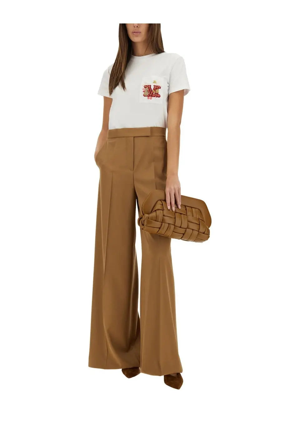 Tan woven leather clutch complementing Max Mara women’s Nunzio white shirt for elegant style