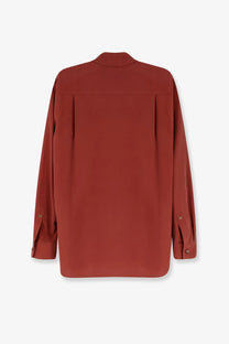 Max mara women’s siamese silk shirt brown showing sleek rust-colored silk blouse with modern cut and subtle back pleats