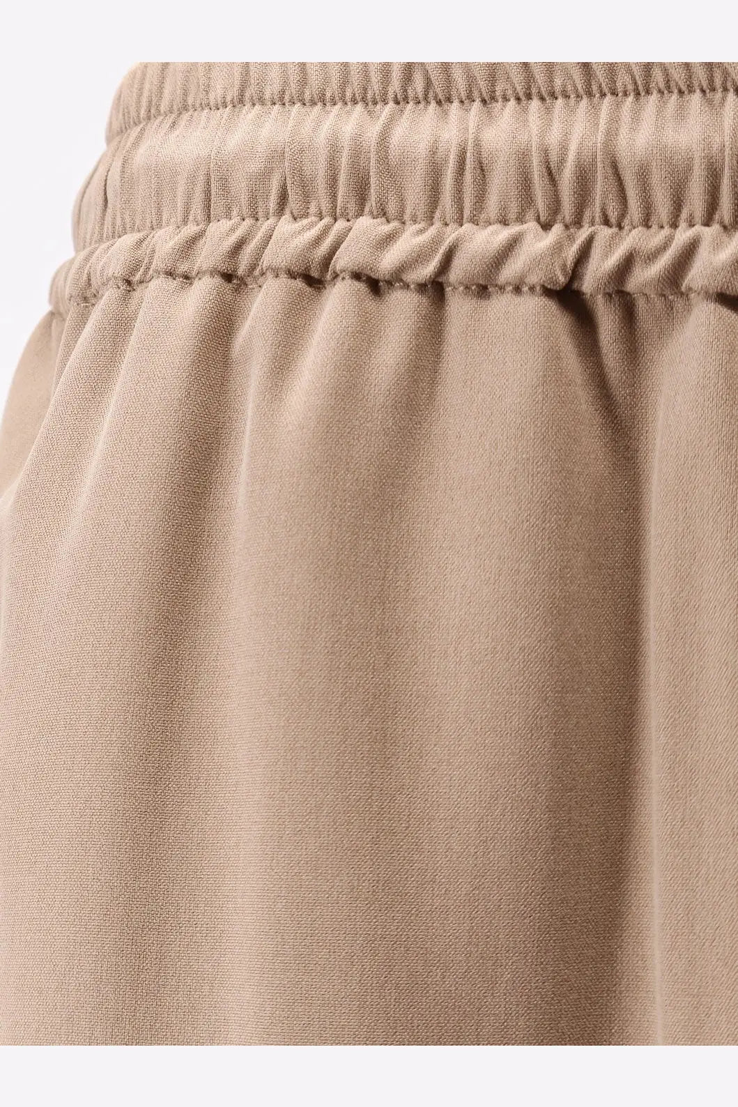 Max Mara women’s beige silk trousers with a relaxed fit and comfortable cotton drawstring waist