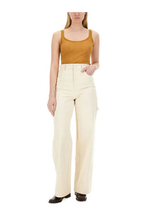 Cream-colored high-waisted wide-leg trousers with a tailored design paired with max mara women’s bastia beige tank top