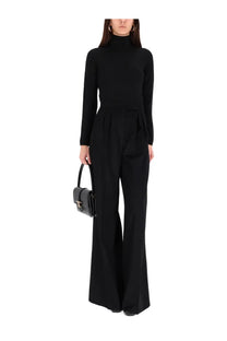 Black leather handbag with structured rectangular shape and prominent metallic clasp for max mara women turtleneck sweater meana black