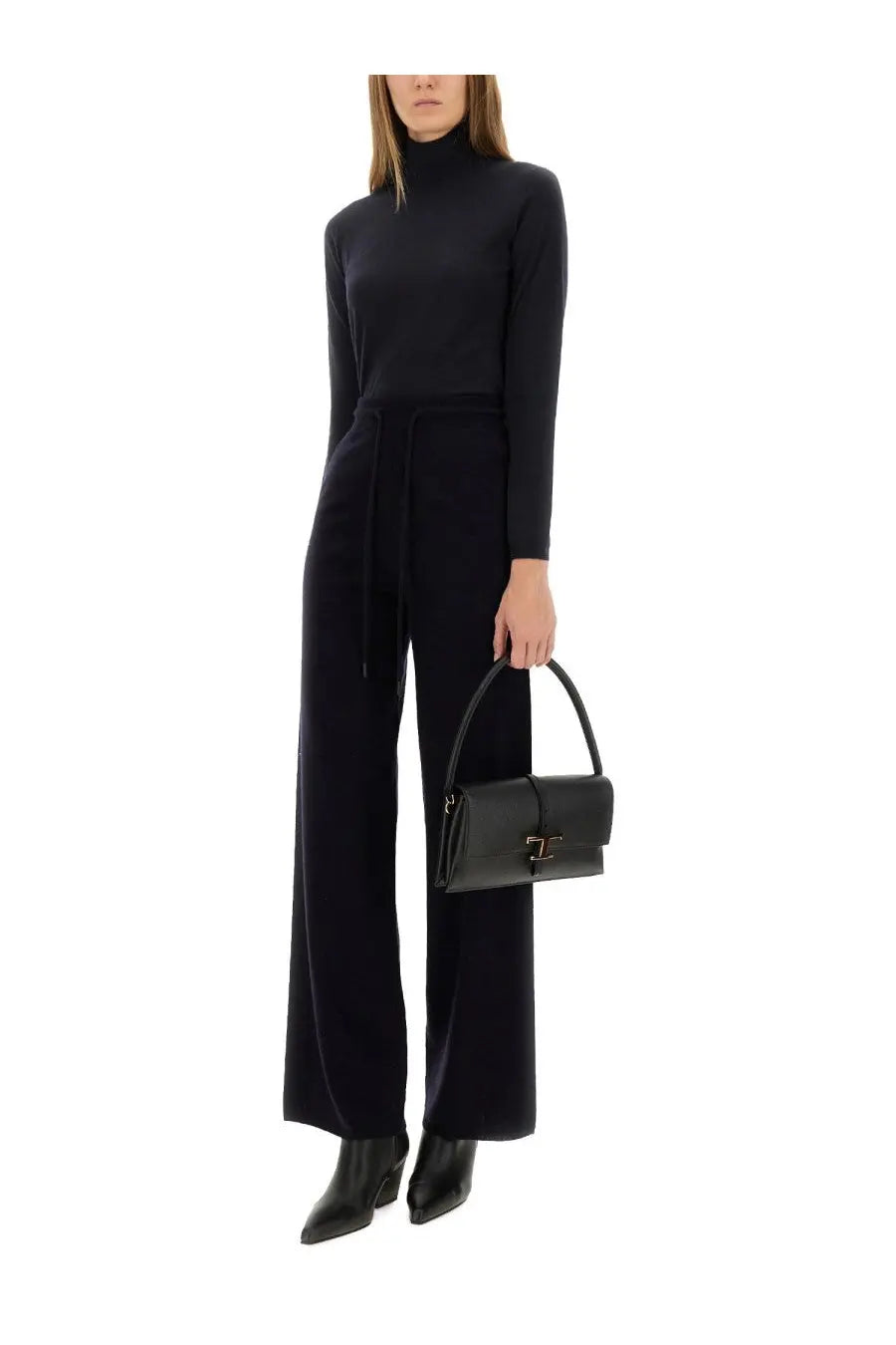Black leather handbag with distinctive gold-tone clasp and top handle complementing Max Mara Meana blue turtleneck sweater