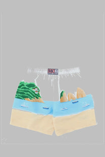 Mc2 saint barth men’s beige shorts with colorful seaside print of green hills blue water and boats for summer wear