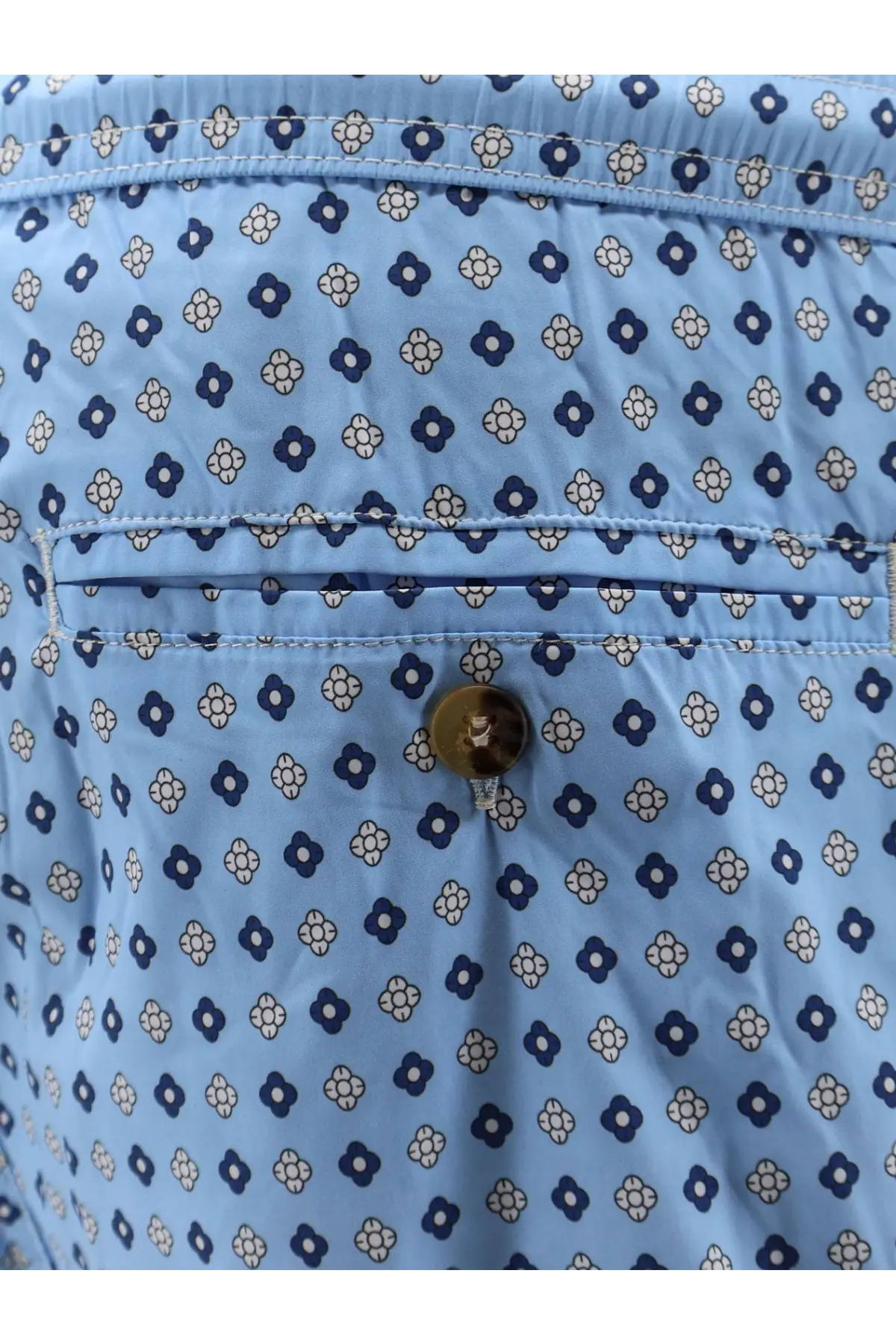 Mc2 Saint Barth men’s nylon swim shorts in blue with light blue cotton shorts and navy white floral motifs and button closure