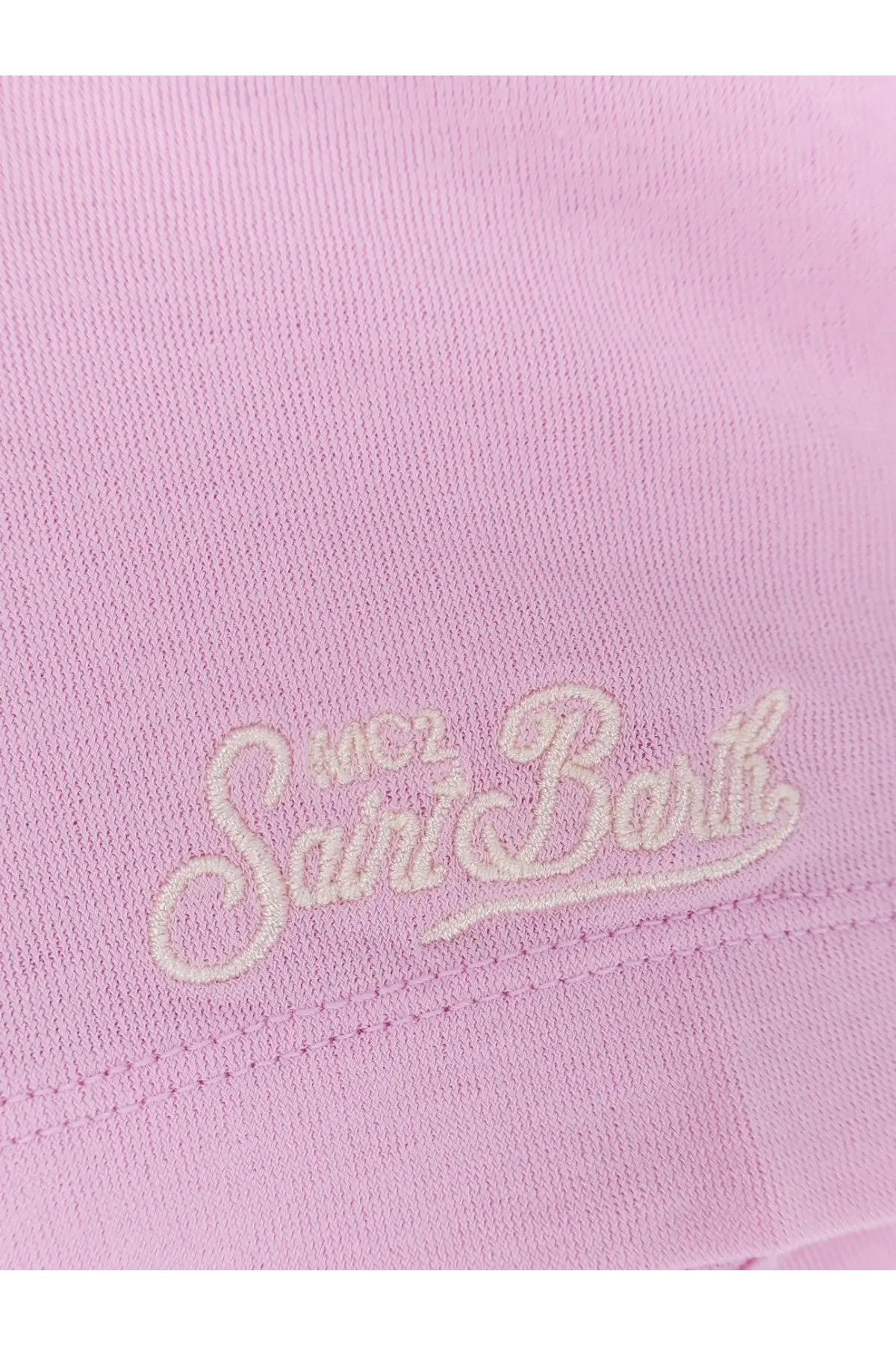 A soft pink cotton shirt featuring an embroidered mc2 saint barth logo in off-white thread