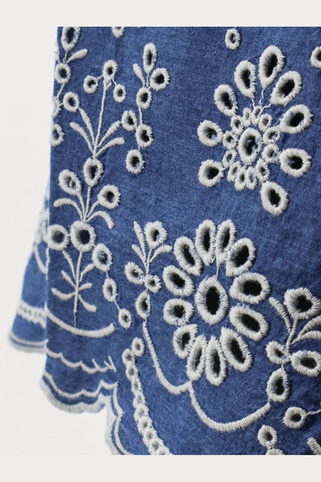 Blue denim cotton shorts by mc2 saint barth featuring intricate white embroidered floral patterns