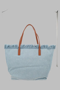 Light blue denim tote bag with brown leather handles and frayed top edge by Mc2 Saint Barth