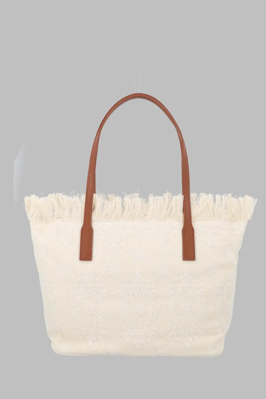 Cream-colored woven tote bag with brown leather handles and fringed top edge from Mc2 Saint Barth white borsa city medium