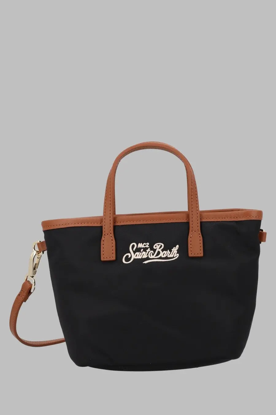 Black canvas tote bag with brown leather handles and trim featuring white saint barth logo by mc2 saint barth