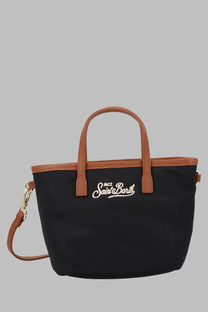 Black canvas tote bag with brown leather handles and trim featuring white saint barth logo by mc2 saint barth